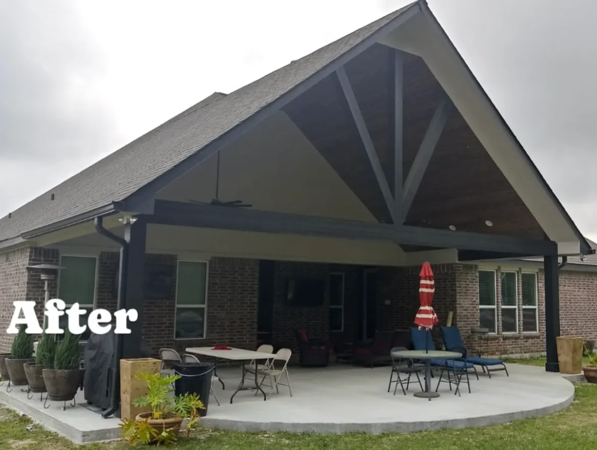 Finished patio cover over a new curved concrete patio with outdoor furniture